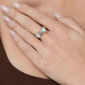 ANILLO DE VARIAS FORMAS CHAPADO EN ORO DE 18K CON CIRCONITAS Y CRISTALES